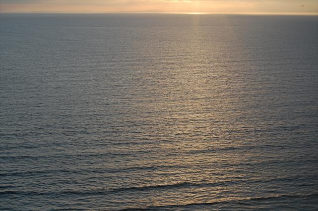 The sea at sunset on Rhossili bay, South Wales.